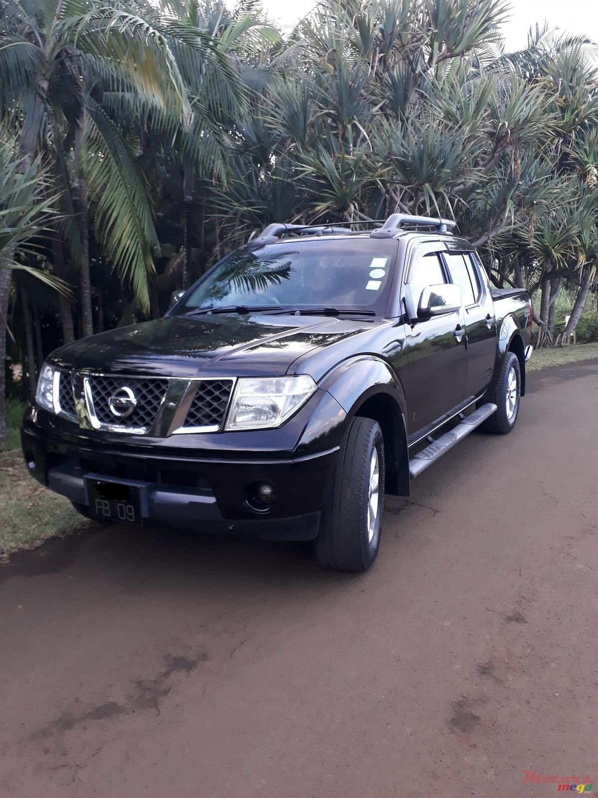 2009' Nissan Navara 2.5 turbo photo #1