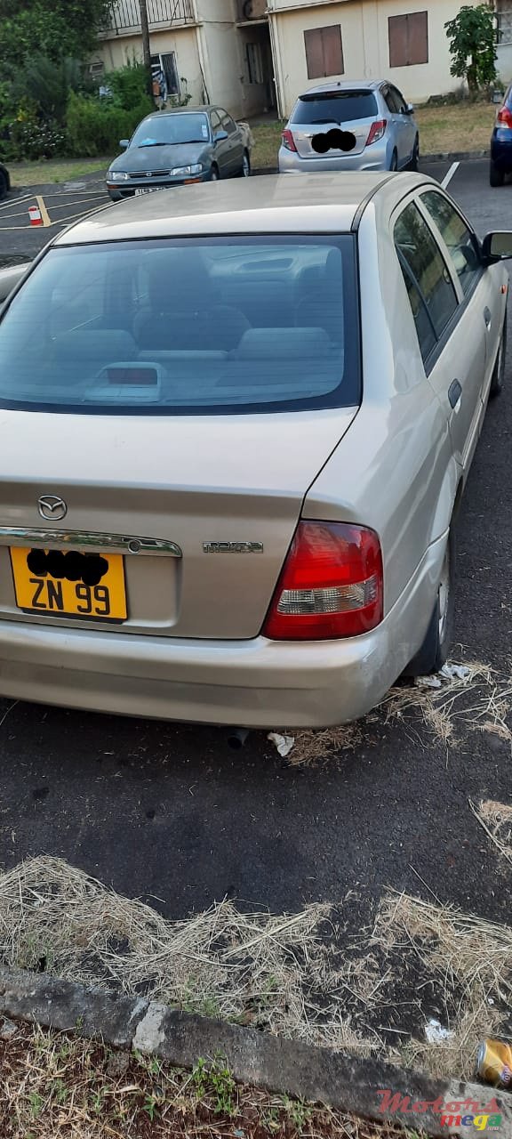 1999' Mazda 323 photo #2