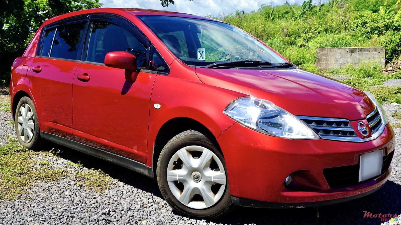 2009' Nissan Tiida photo #1