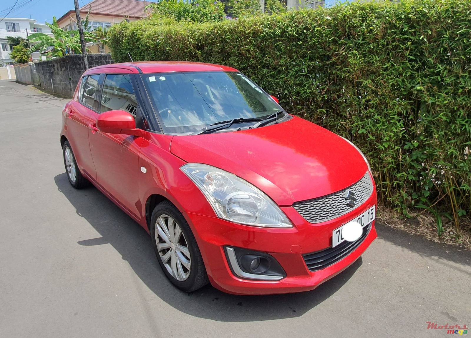 2015' Suzuki Swift photo #1
