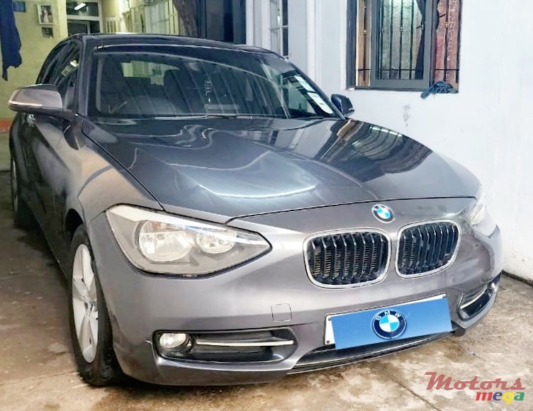 2011' BMW 116 photo #1