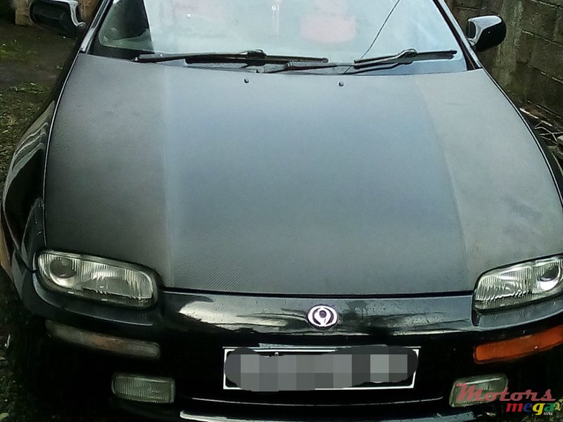 1997' Mazda 323 photo #1