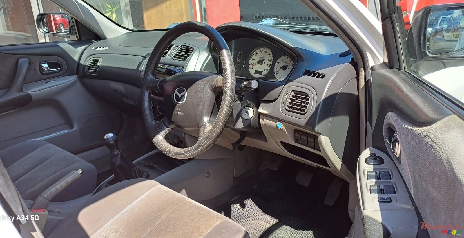 2003' Mazda 323 photo #5