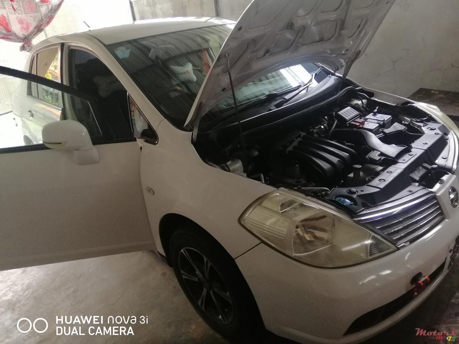 2007' Nissan Tiida photo #1