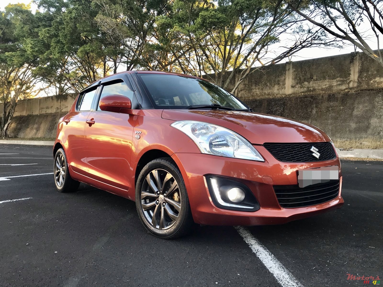 2015' Suzuki Swift photo #1