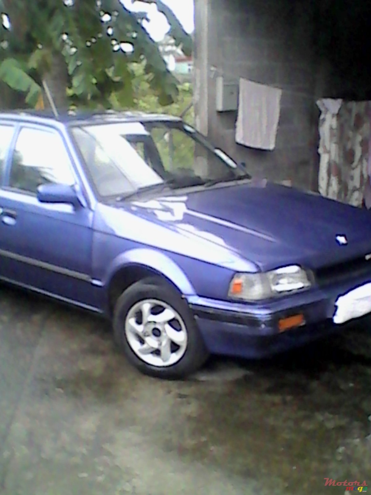 1995' Mazda 323 photo #1