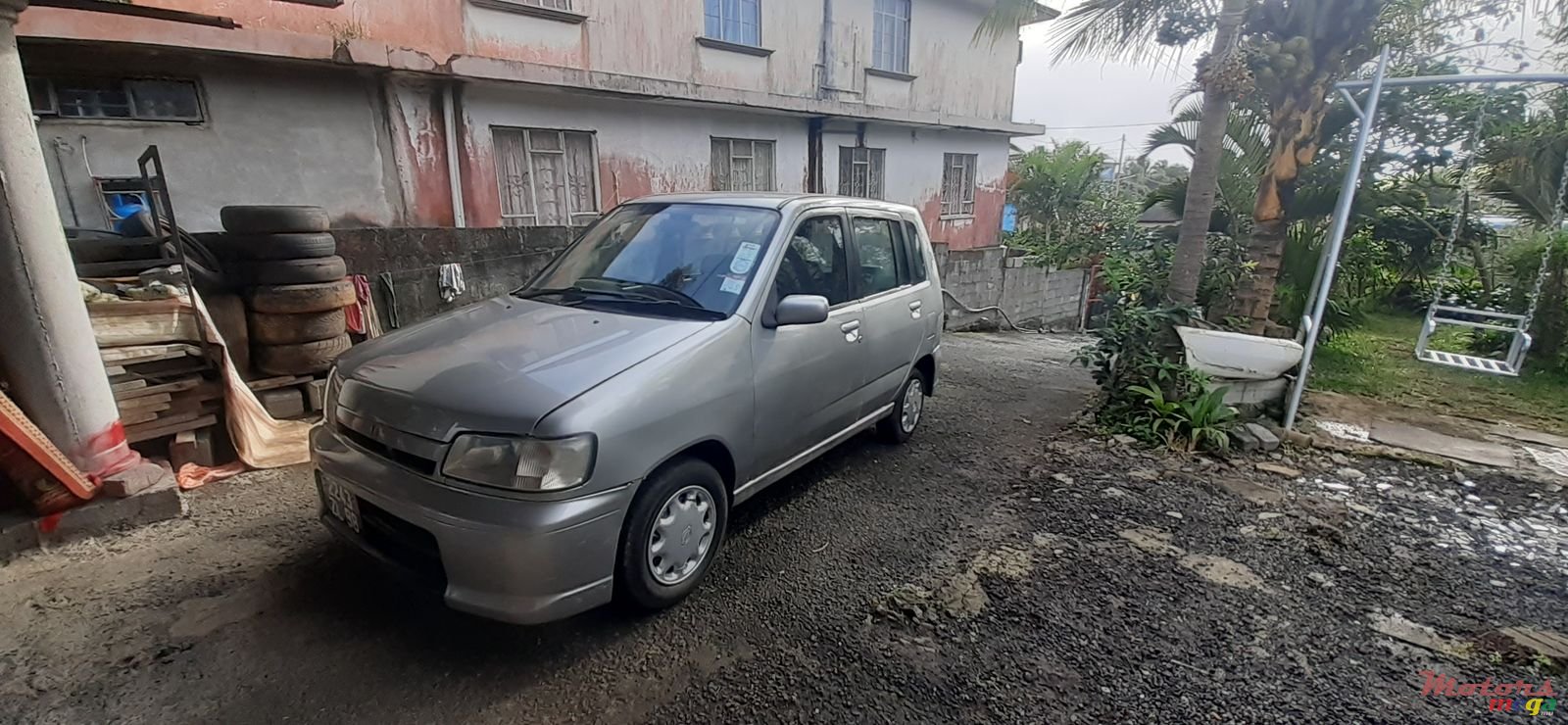 1998' Nissan Cube photo #1
