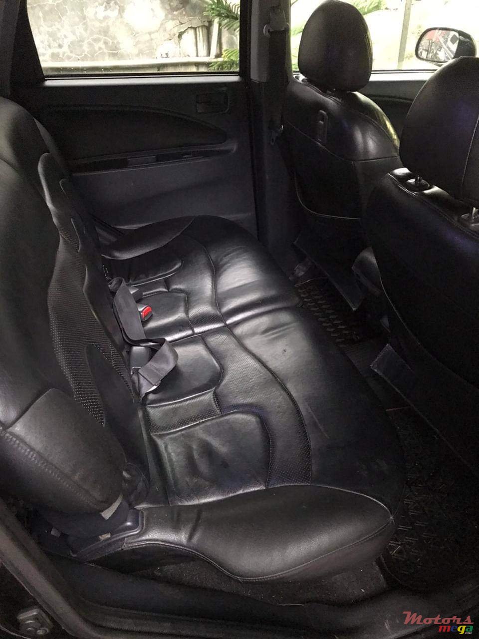 2003' Mitsubishi Colt photo #1