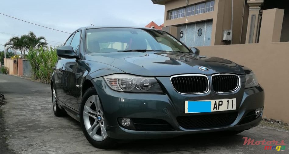 2011' BMW 320 idrive photo #1