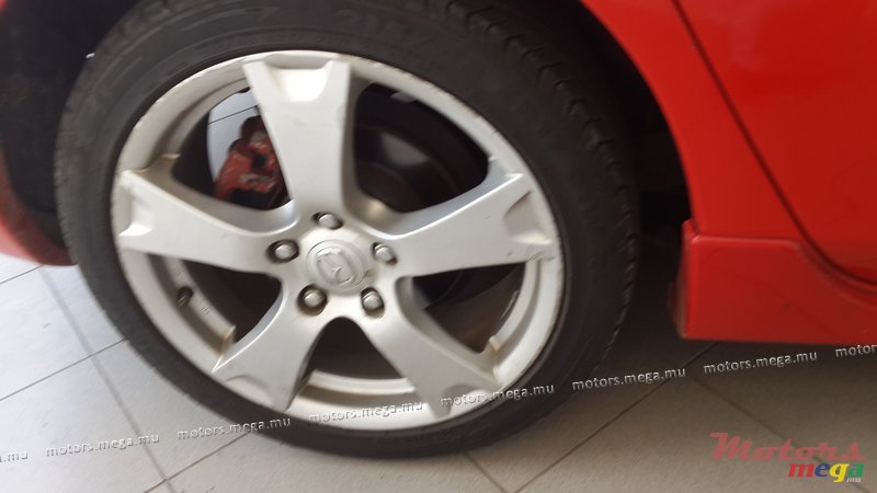 2004' Mazda 3 photo #3