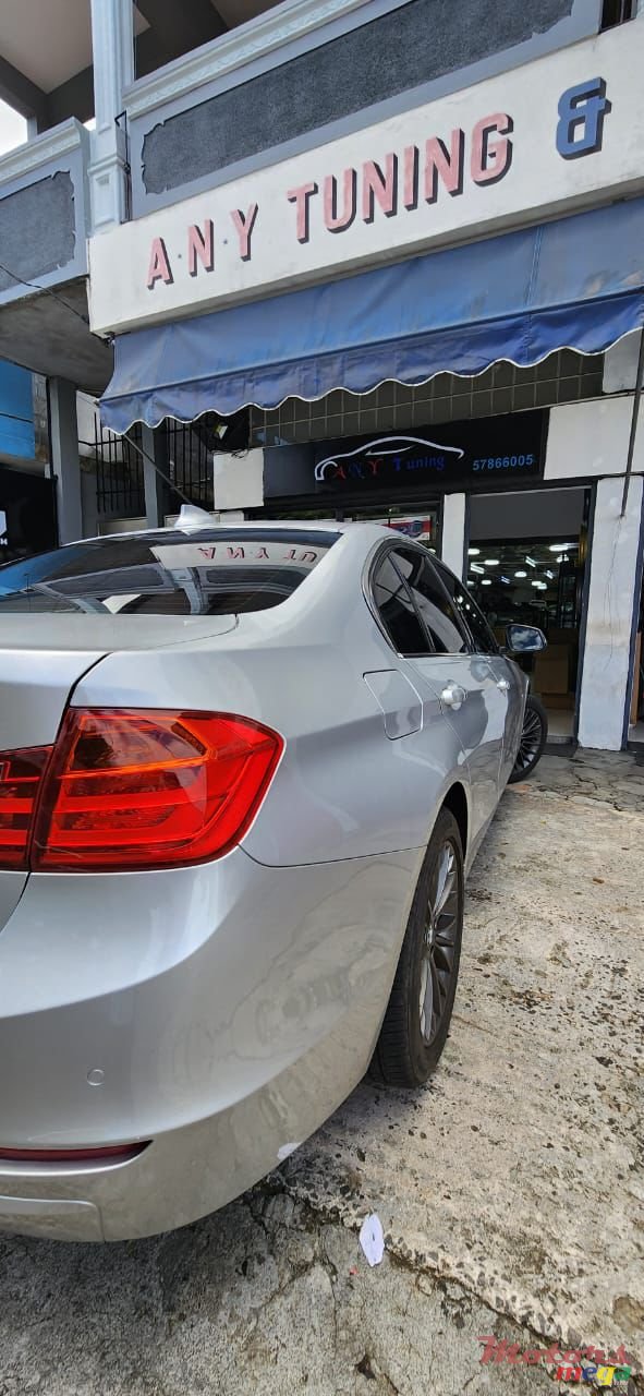 2014' BMW 316 photo #1