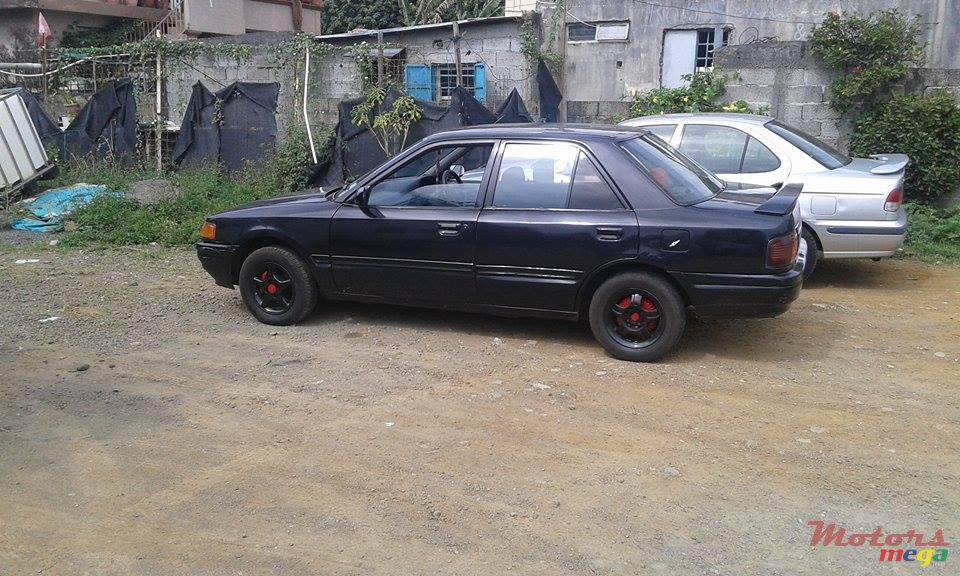 1990' Mazda 323 photo #6