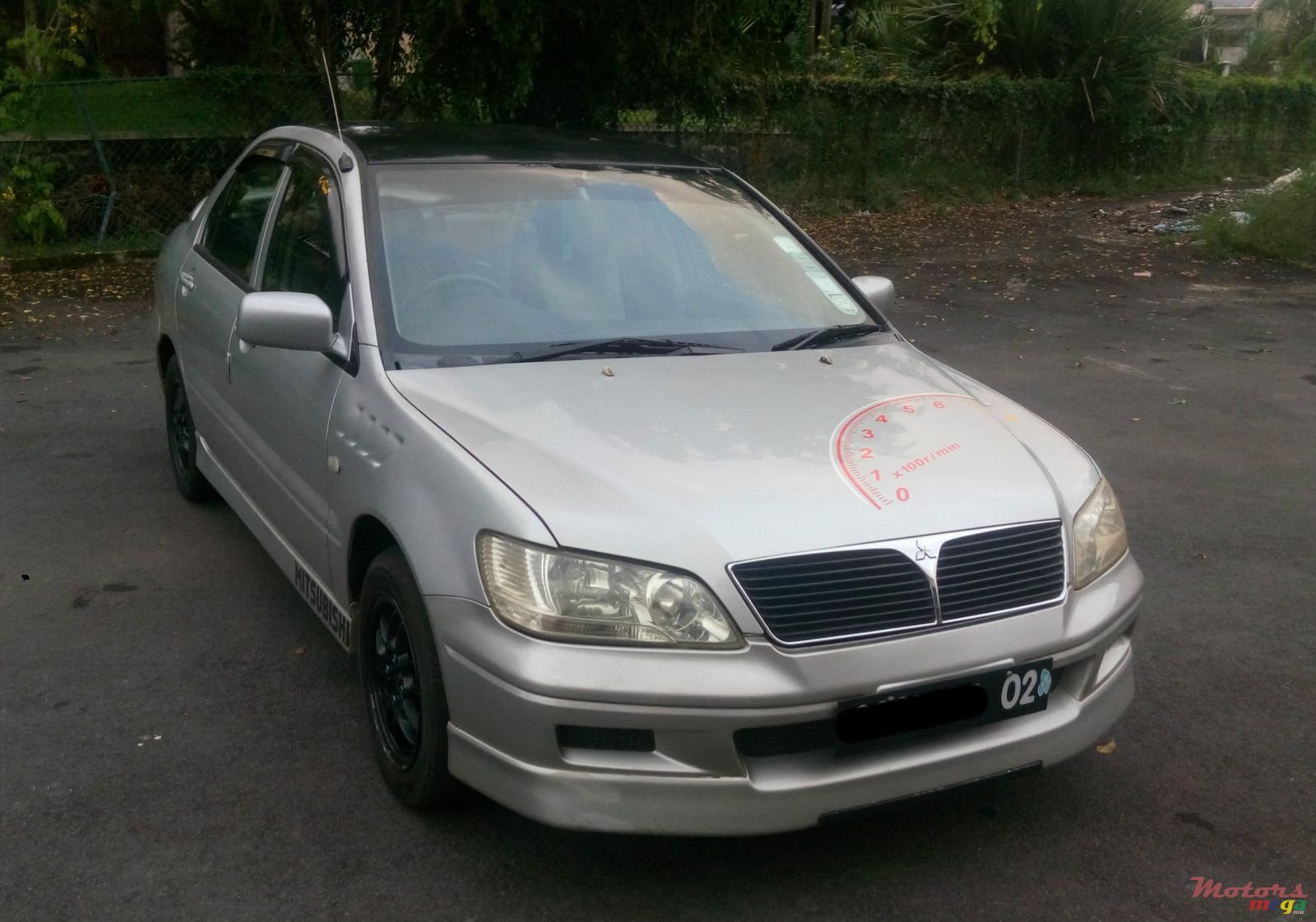 2002' Mitsubishi Lancer photo #1