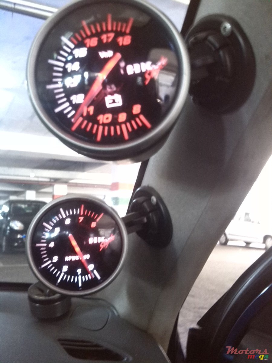 2002' Toyota Duet photo #5