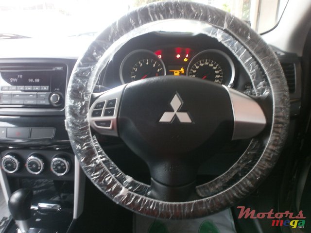 2016' Mitsubishi Lancer EX photo #6