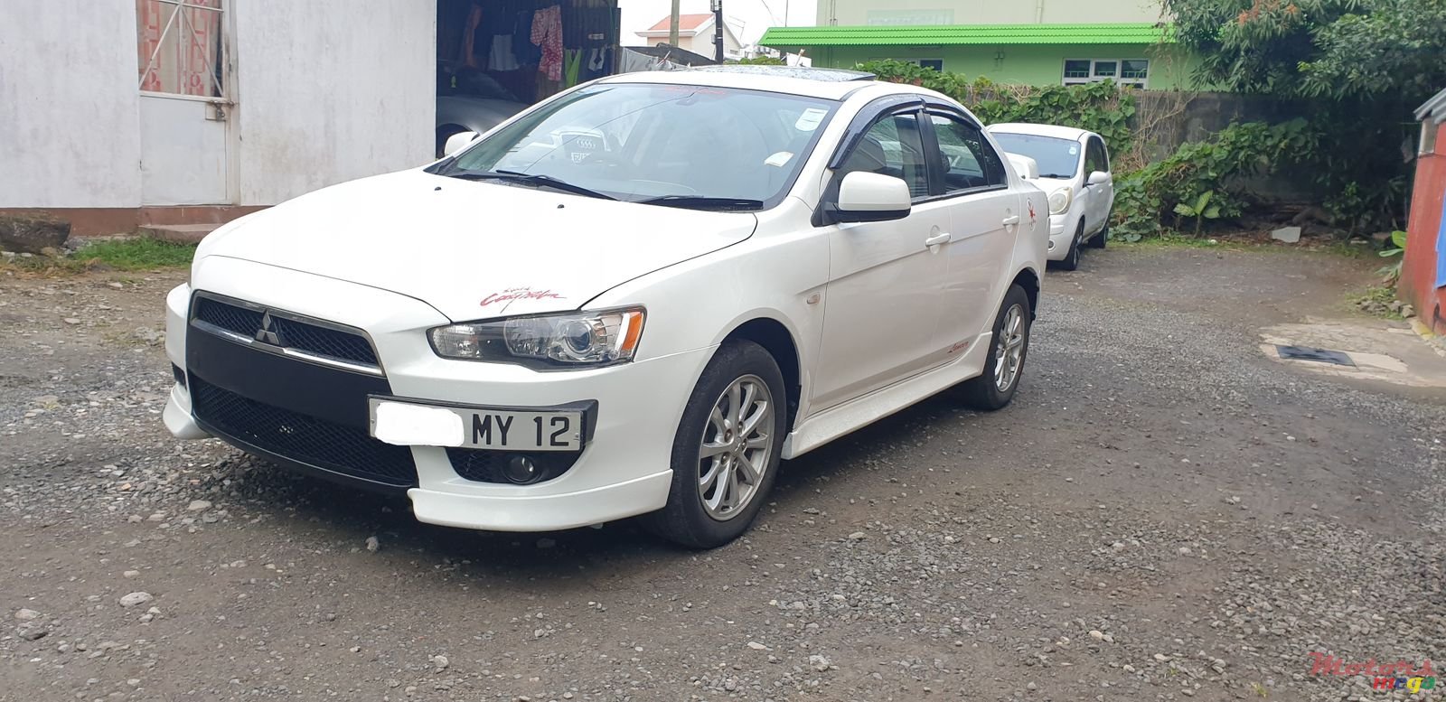 2012' Mitsubishi Lancer Ex photo #1