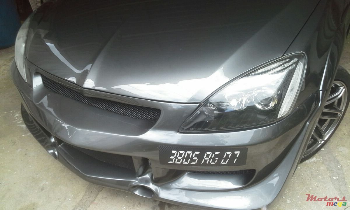 2007' Mitsubishi Lancer X GLX photo #1