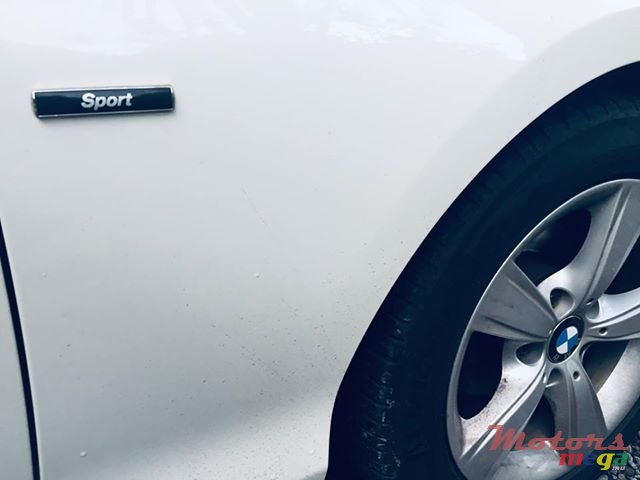 2012' BMW 116 photo #6