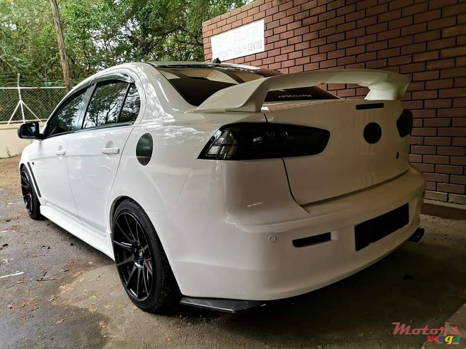 2013' Mitsubishi Lancer photo #2