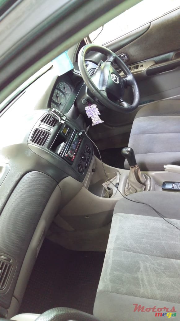 2002' Mazda 323 photo #5