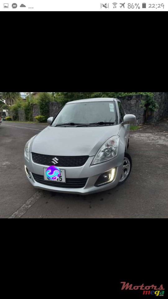 2015' Suzuki Swift photo #1