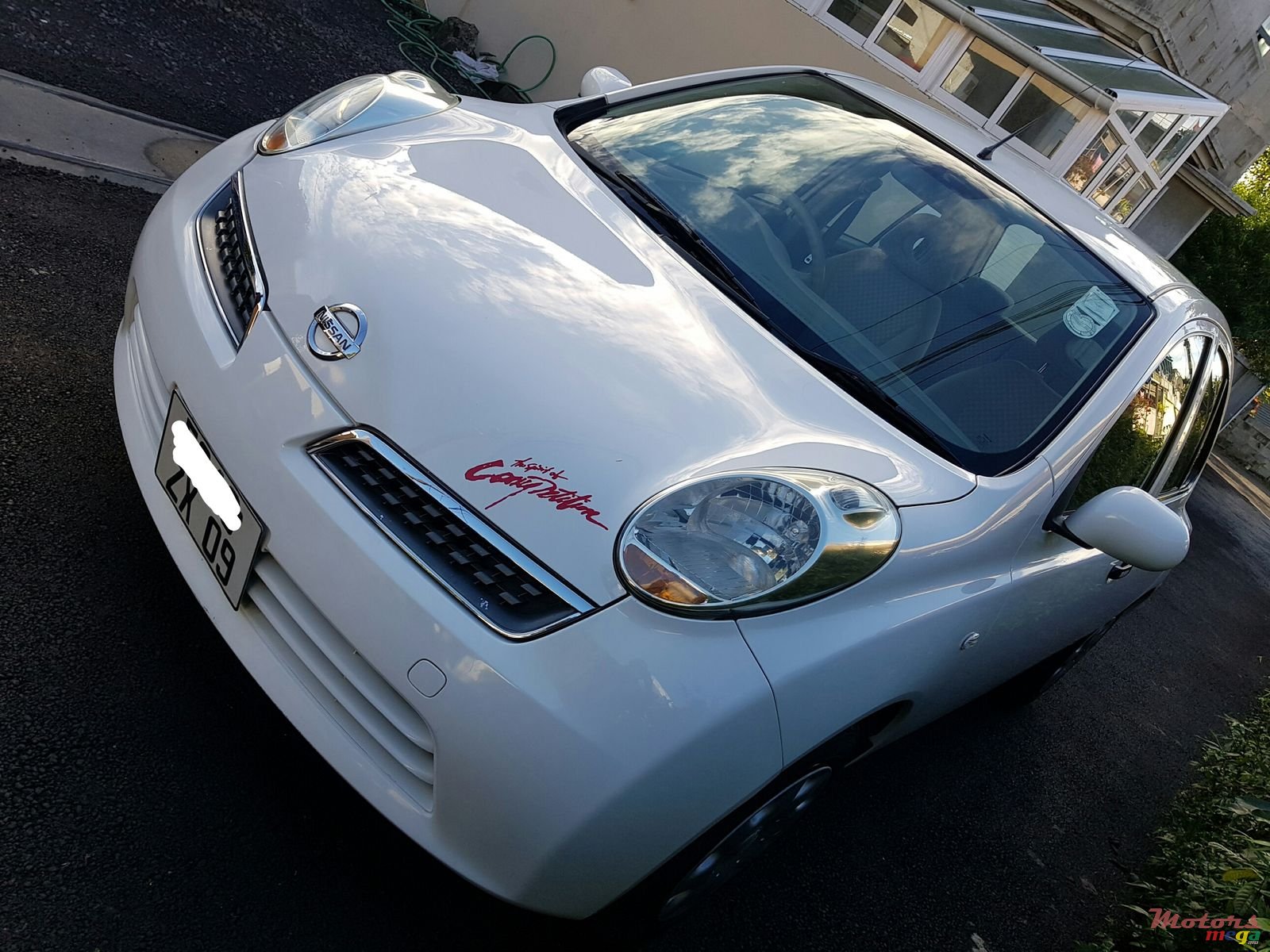 2009' Nissan March automatic photo #1