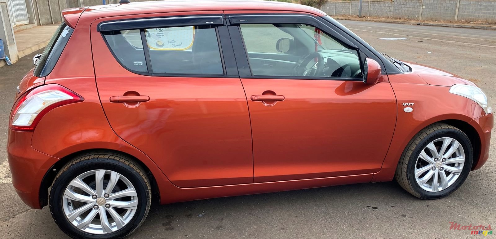 2015' Suzuki Swift photo #1