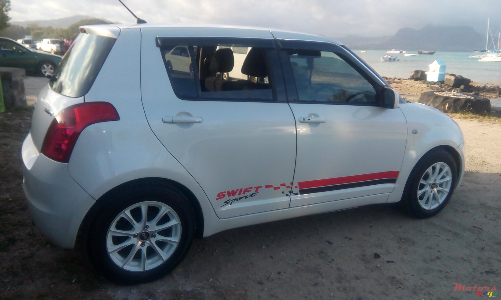 2009' Suzuki Swift photo #1