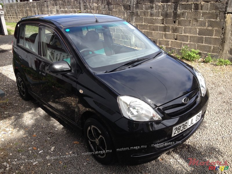 2009' Perodua Viva SX photo #2