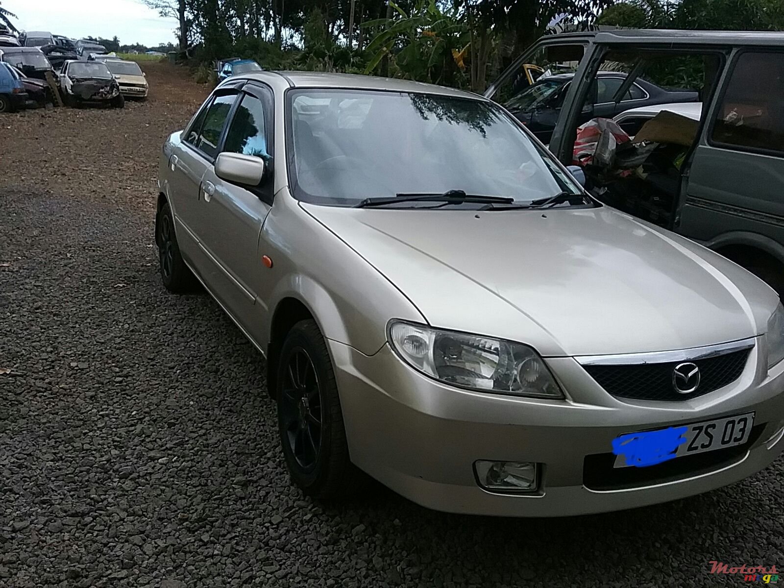 2003' Mazda 323 photo #2