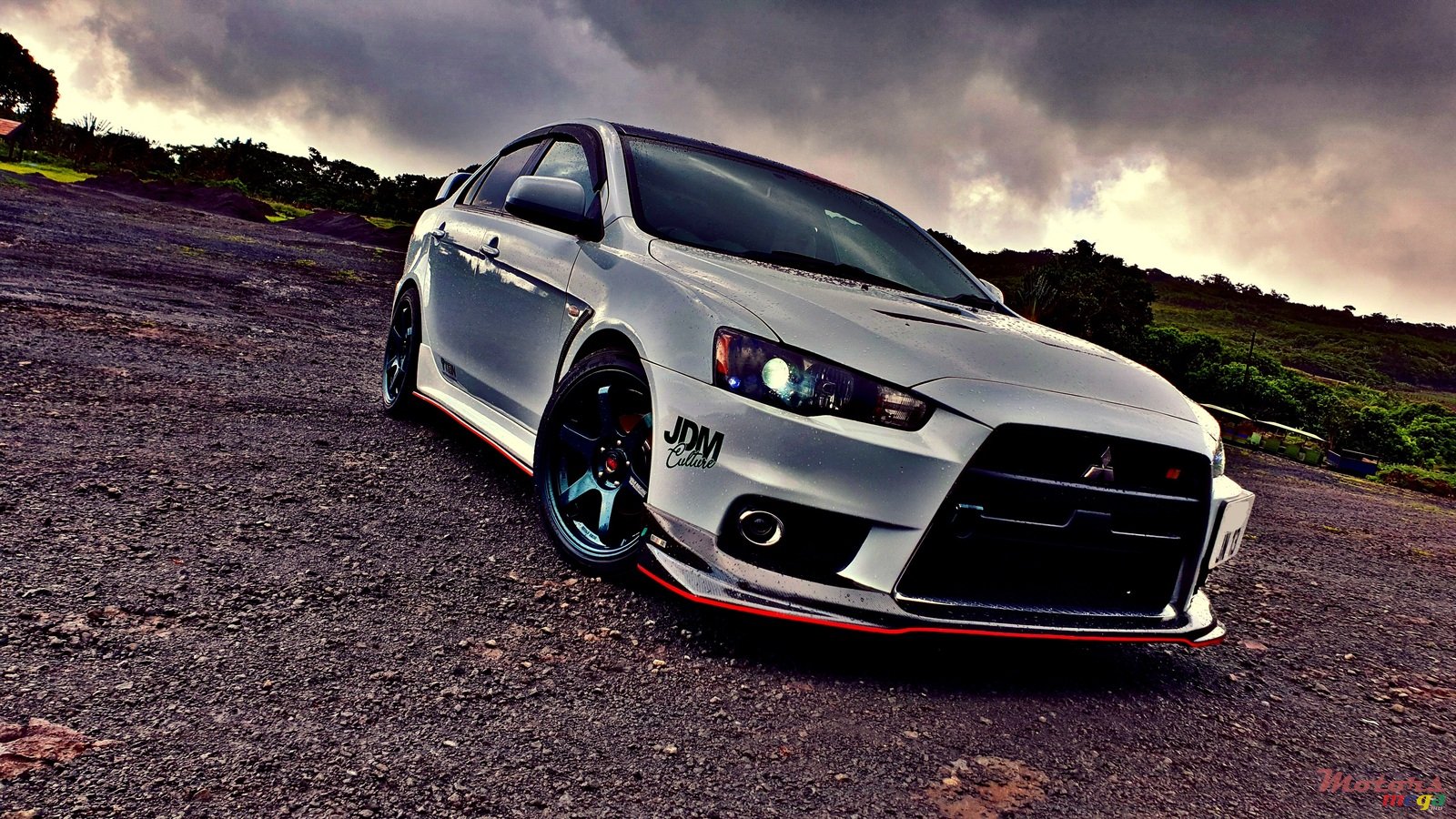 2013' Mitsubishi Lancer EX photo #1