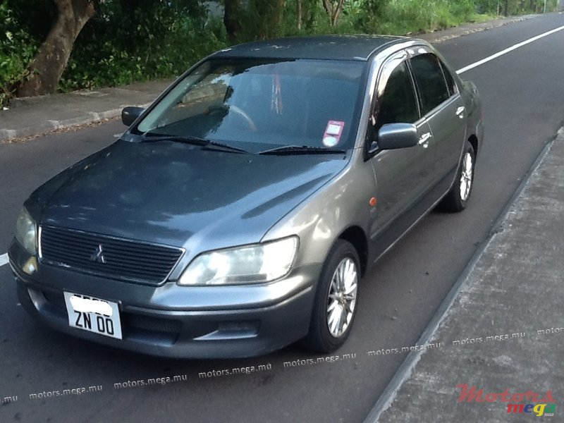 2000' Mitsubishi Cedia photo #1