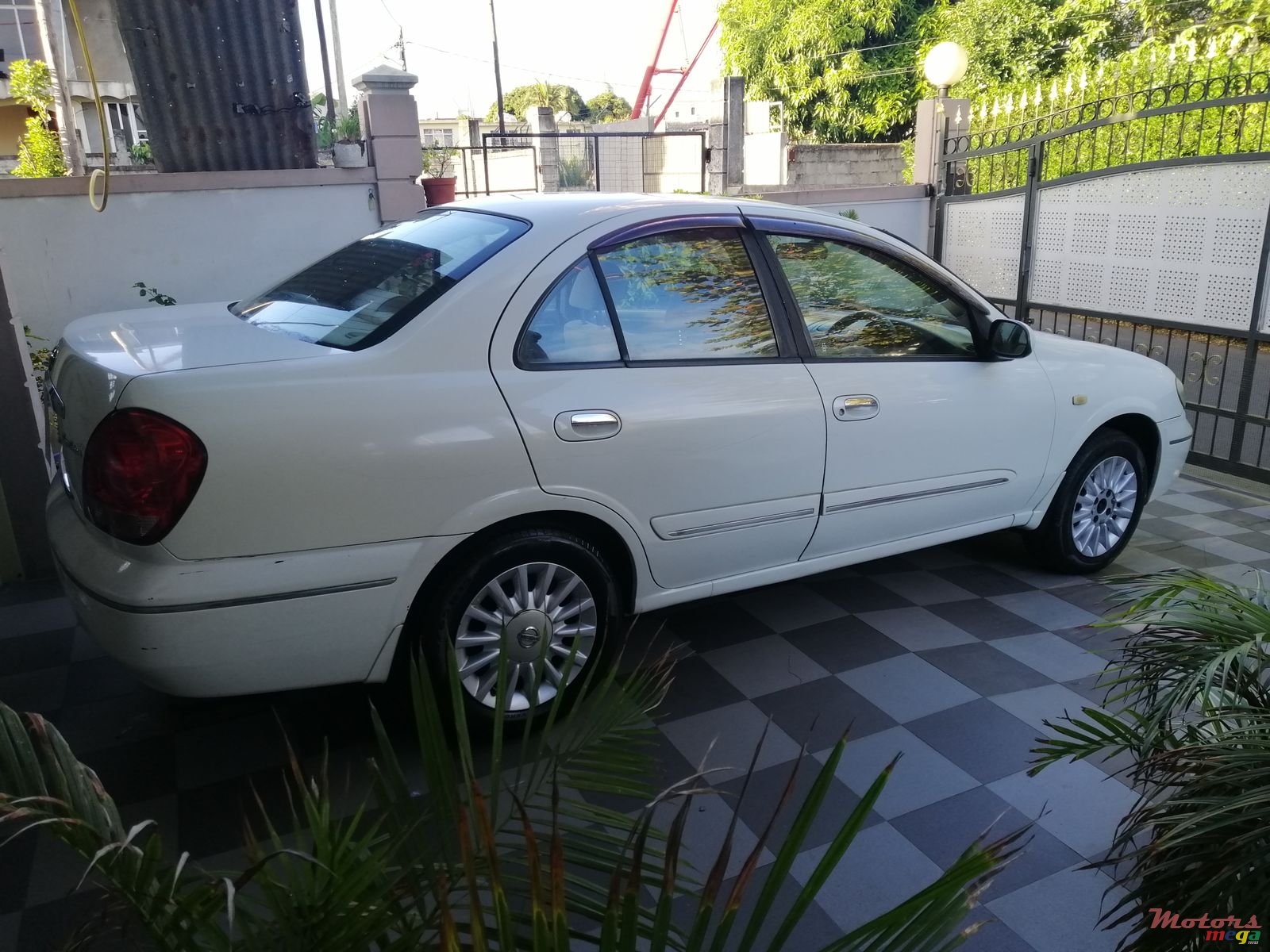 2006' Nissan Sunny photo #5