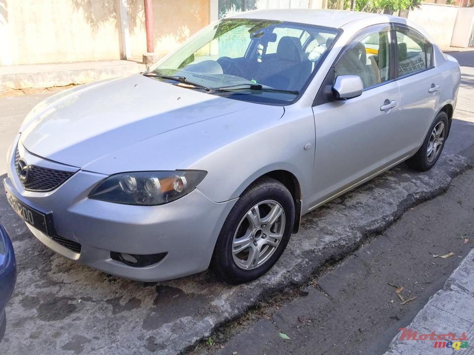 2004' Mazda 3 photo #1