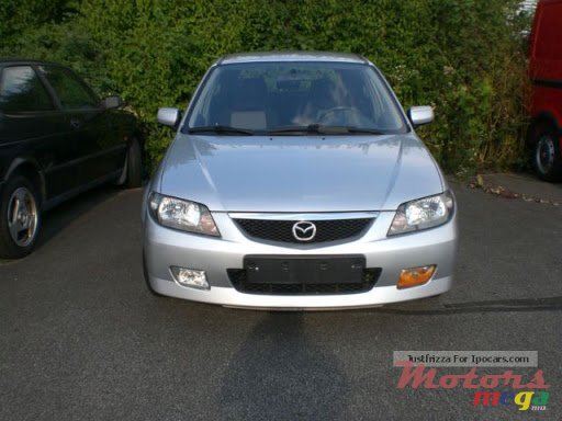 2003' Mazda 323 photo #1
