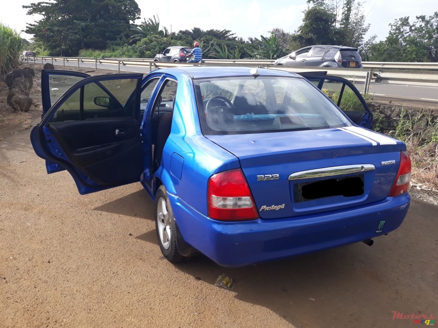 2003' Mazda 323 photo #2