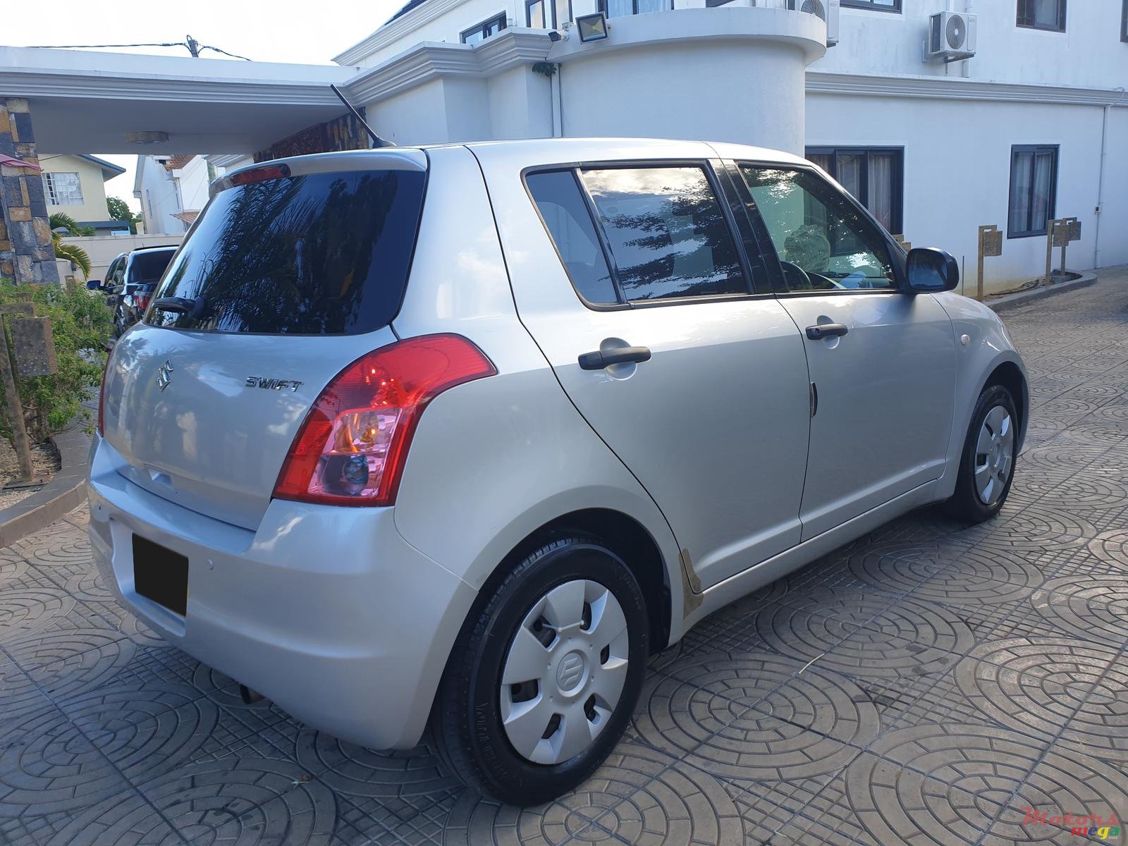 2009' Suzuki Swift photo #1