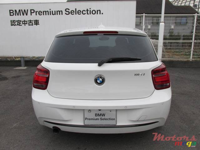 2012' BMW 116 photo #7