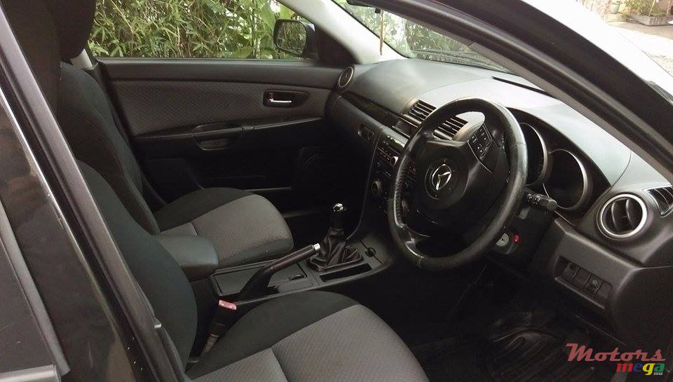 2006' Mazda 3 manual photo #5