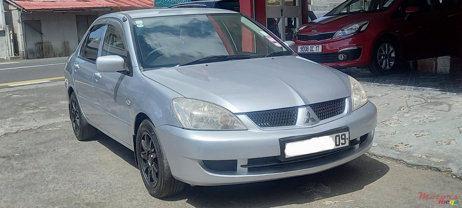 2009' Mitsubishi Lancer GLX photo #1