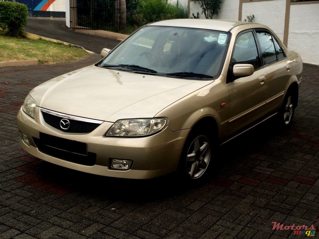 2002' Mazda 323 photo #1