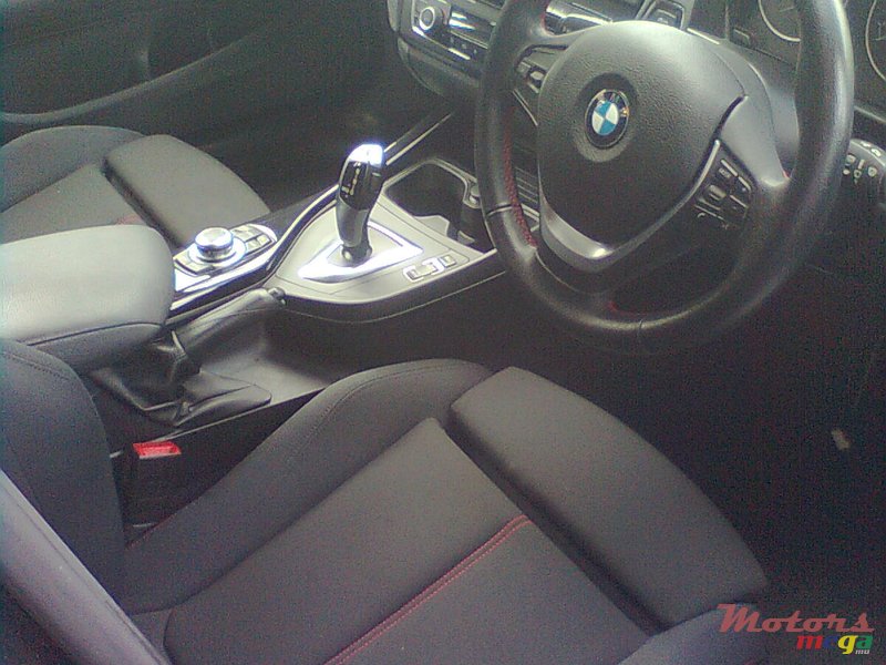 2012' BMW 116 photo #2