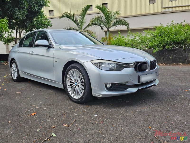 2014' BMW 116 Luxury Line photo #2