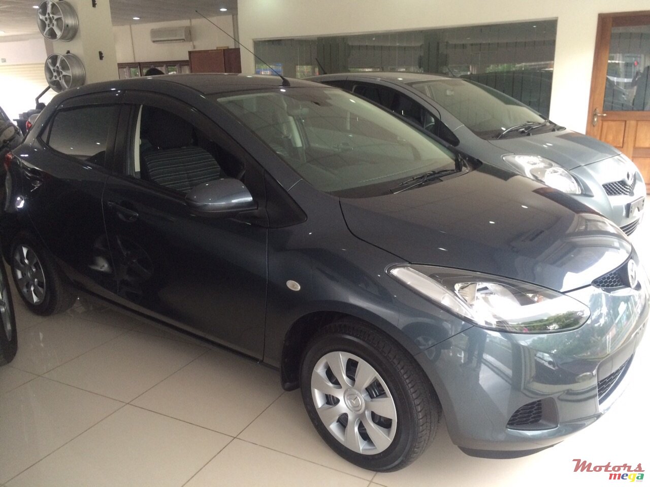 2010' Mazda Demio photo #1