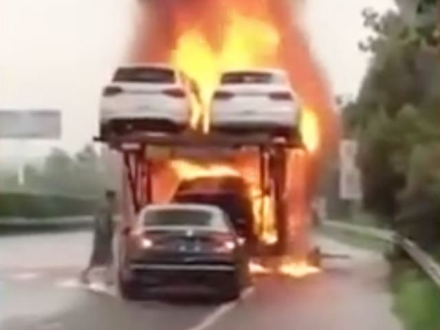 Would You Risk Your Life To Save A Car From A Burning Transport Truck?