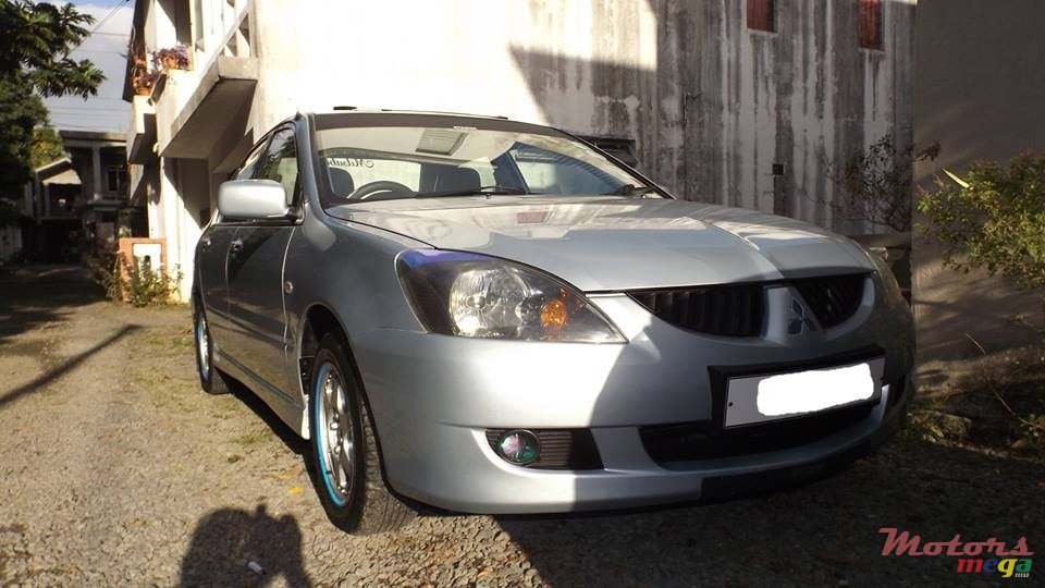 2004' Mitsubishi Lancer GLX photo #1