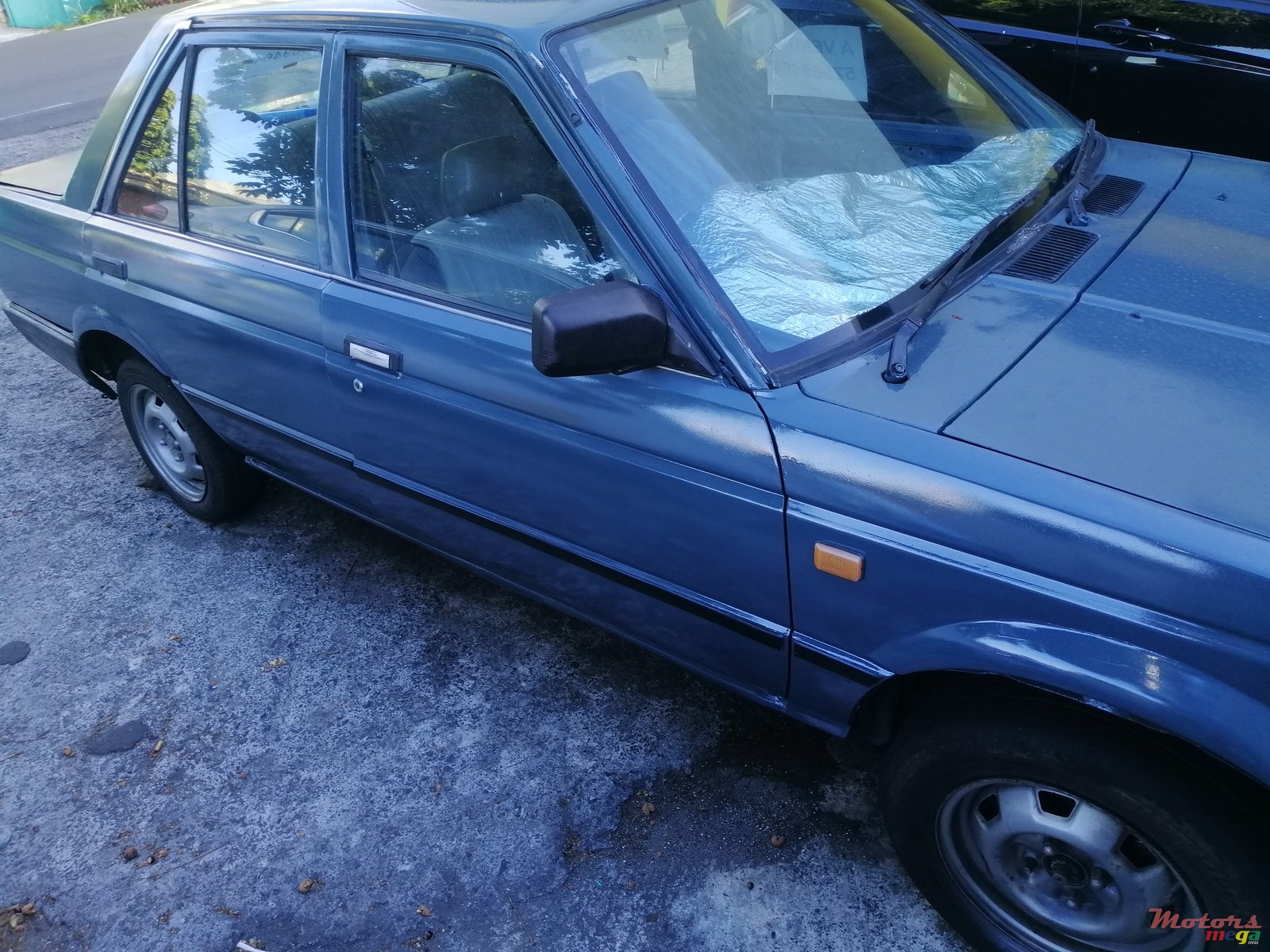 1988' Nissan Sunny B 12 photo #1
