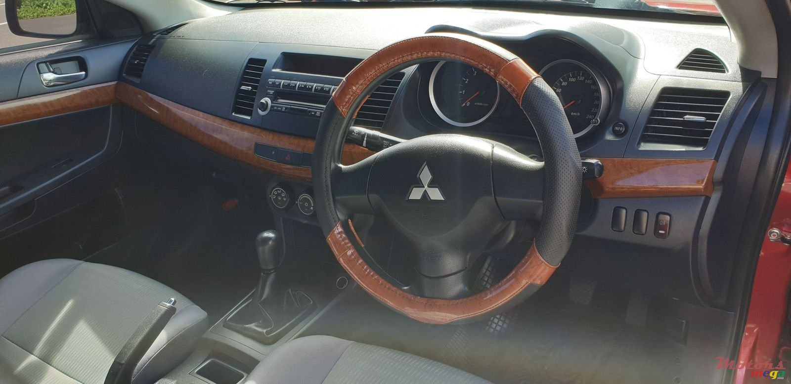 2012' Mitsubishi Lancer Ex photo #3