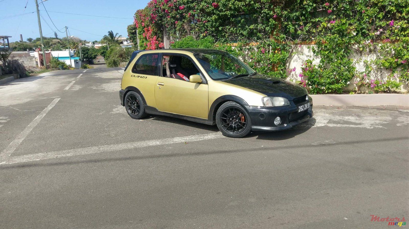 1999' Toyota Starlet Glanza photo #1