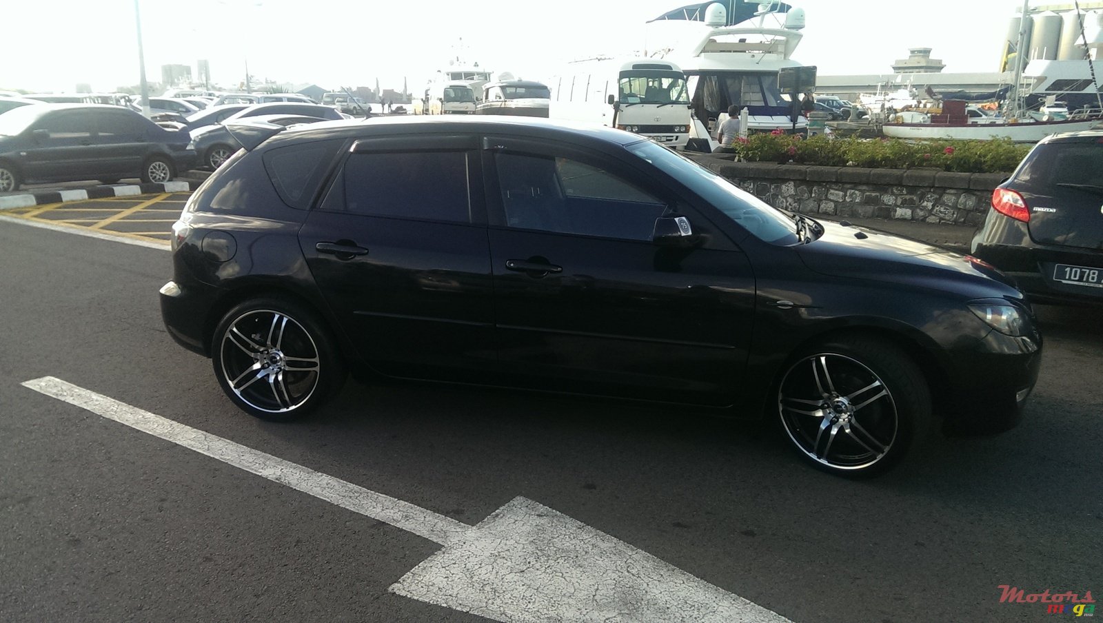 2007' Mazda 3 HB photo #1